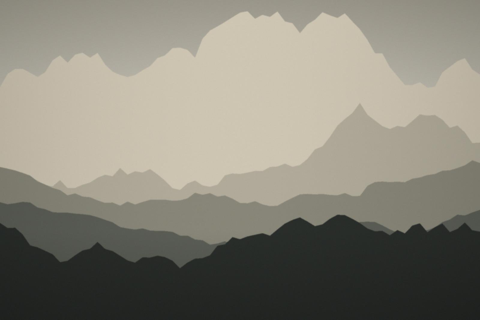 A river running between green and brown mountainsides