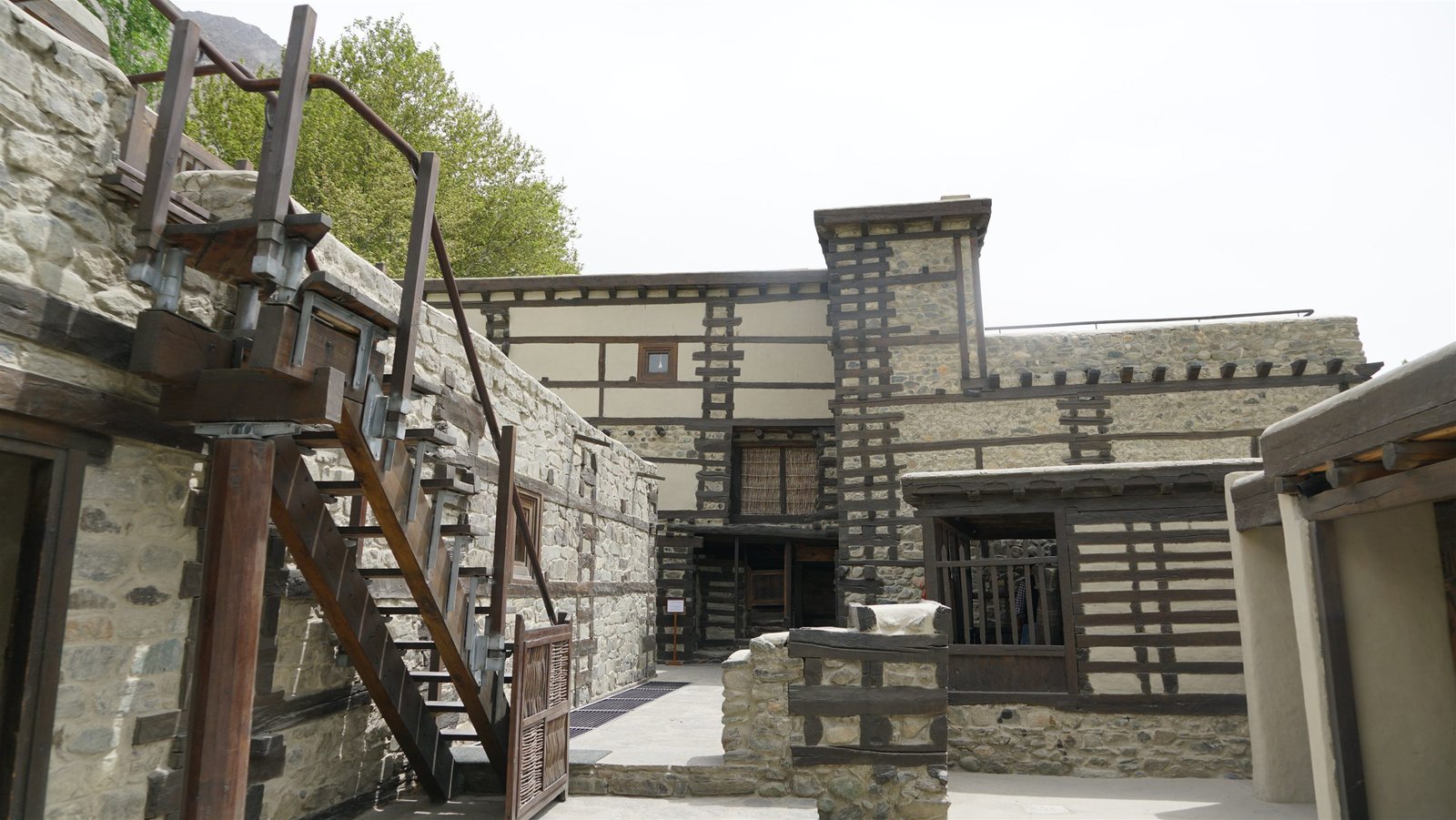 The restored stone and timber courtyard inside Shigar Fort