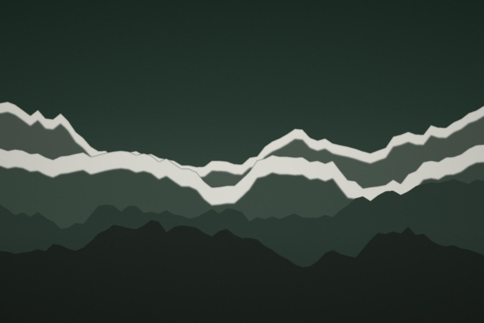 Snow-covered peaks under a partly clouded sky